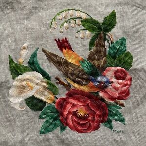 Floral and Bird unframed cross stitch peice on linen